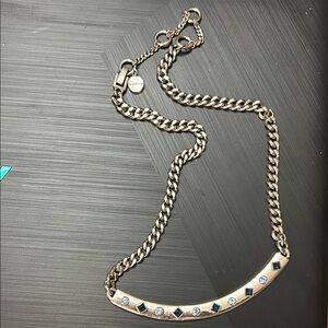 Charming Gold Necklace with Black and Silver Accents